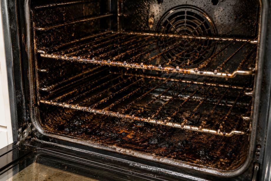 Dirty oven with heavy grease and carbon buildup in Mandurah home