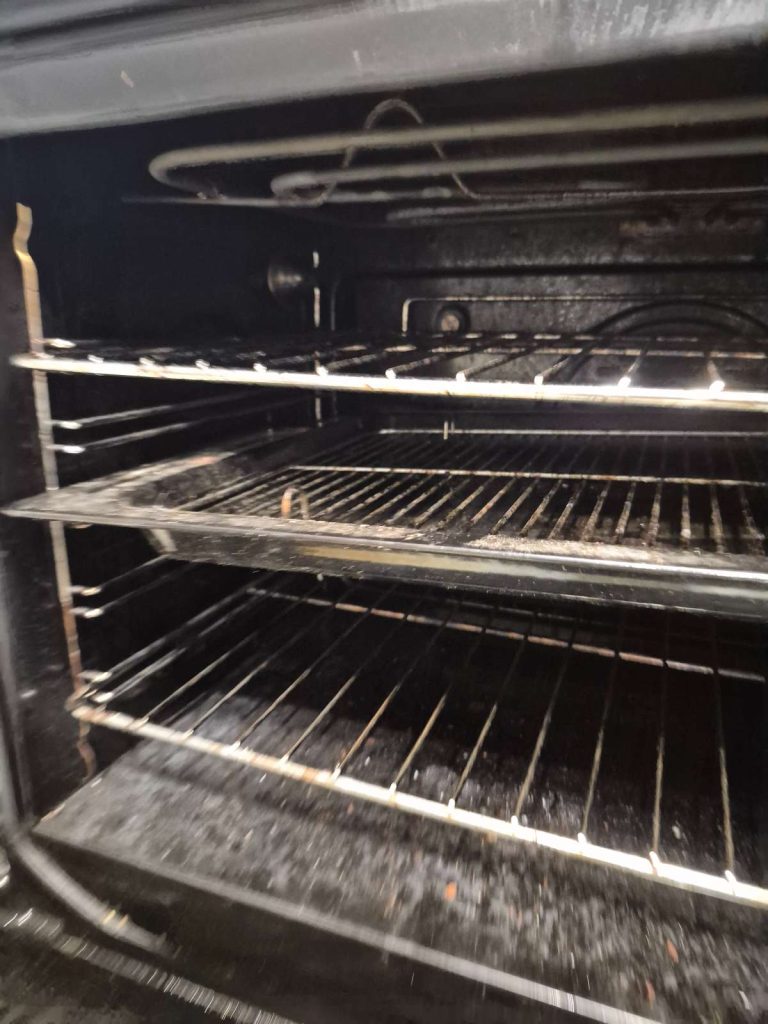 Dirty oven interior before professional oven cleaning in Mandurah with heavy grease and burnt-on grime buildup